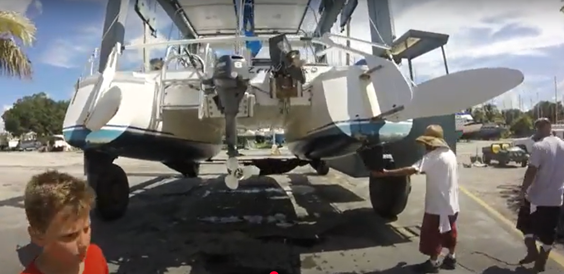 Boat on lift out of water - walkaround - 71 Iroquois catamaran